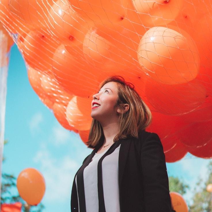 Liam Chen, Client Relations Director, discussing corporate gifting strategy with business clients